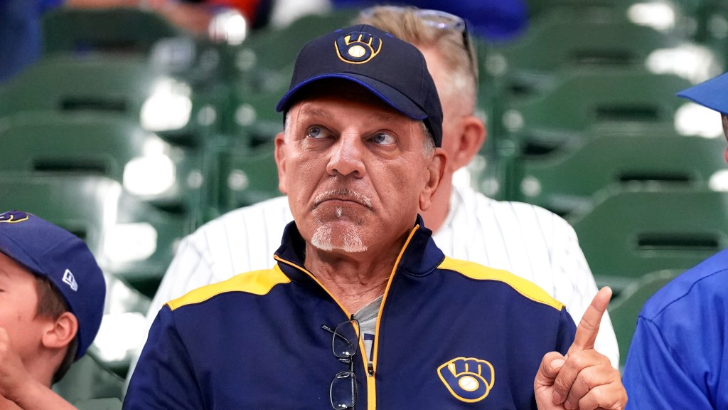 Dad Shushes Family While Focused On Jumbotron Hat Shuffle