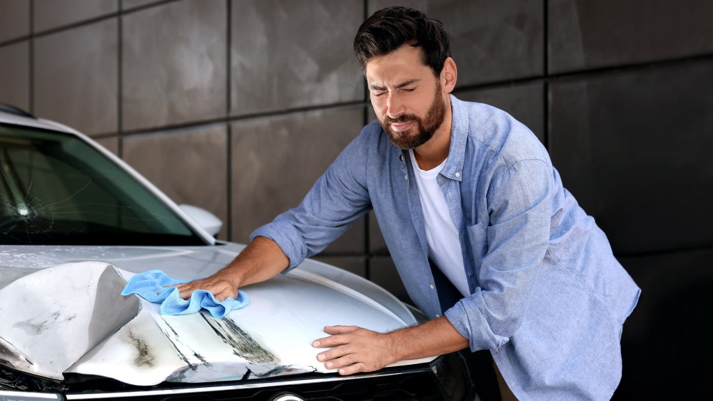 Man Unsure How To Get Old Lady Smell Out Of Hood Of Car